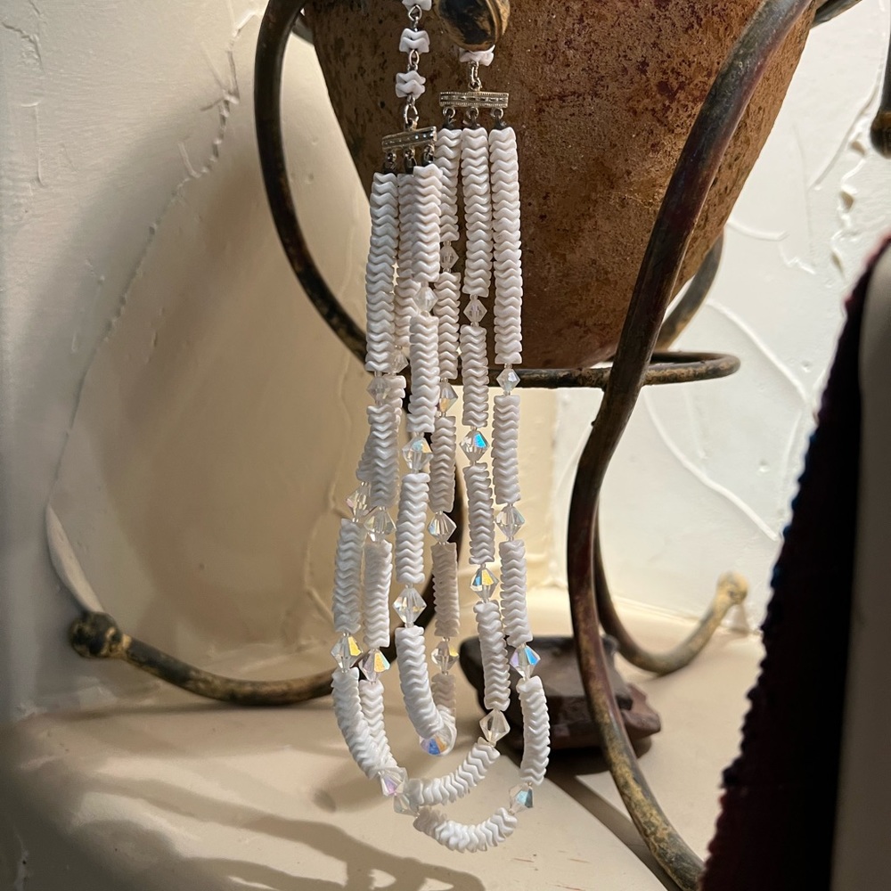 Beautiful white triple strand necklace. 16” long.